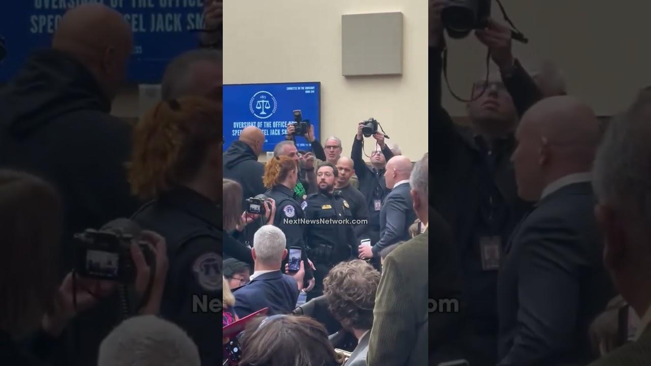 CAUGHT ON CAMERA: Deep State Operative ATTACKS Patriot Outside Jack Smith's Sham Hearing