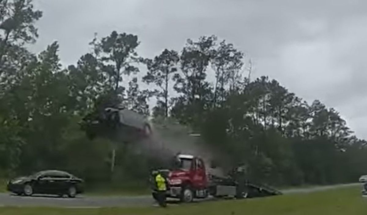 Unbelievable Footage: Car Catapults 120 Feet High After Slamming Tow-Truck Ramp in Georgia - A Must-Watch!