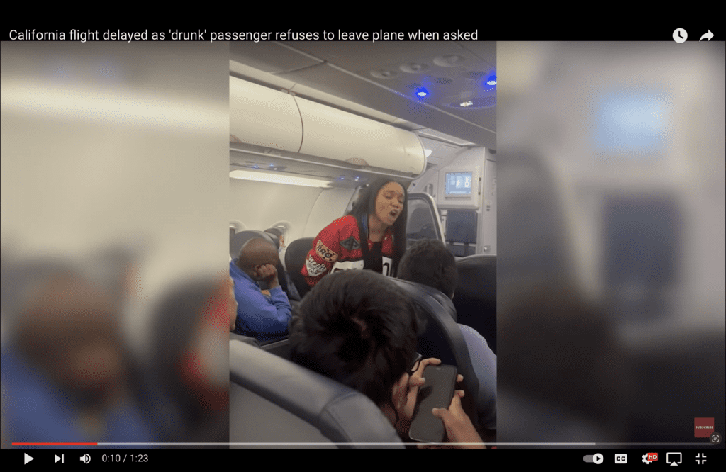 Furious Airline Passengers Confront Intoxicated Woman for Delaying Flight & Harassing Others (VIDEO)