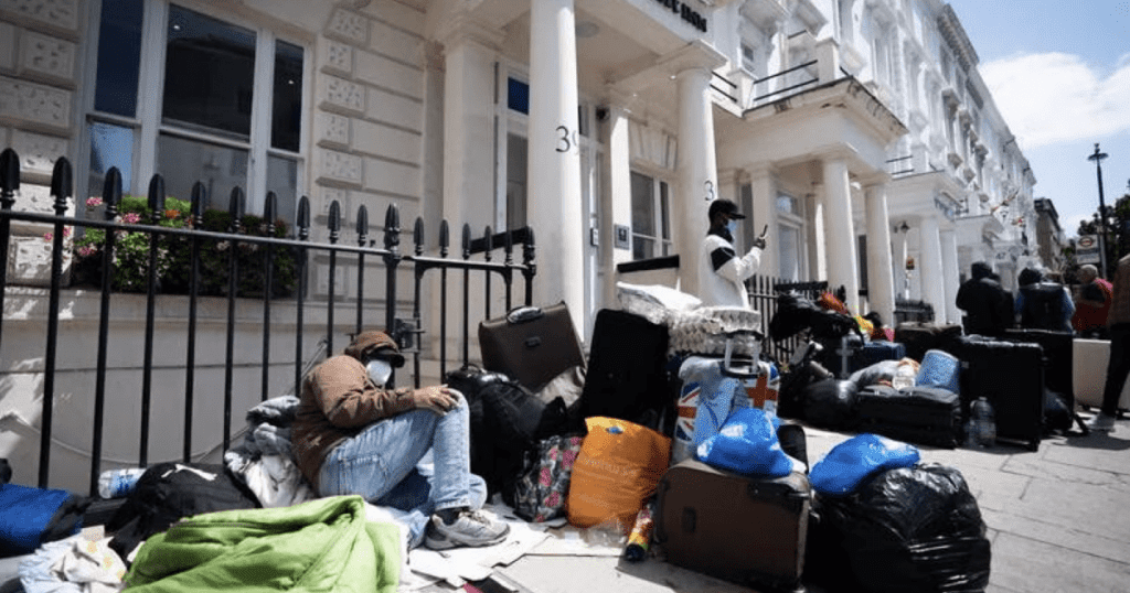 Shocking Display: Ungrateful Migrants in London Budget Hotel Demand Private Rooms, Improved WiFi, and Increased Financial Support (VIDEO)
