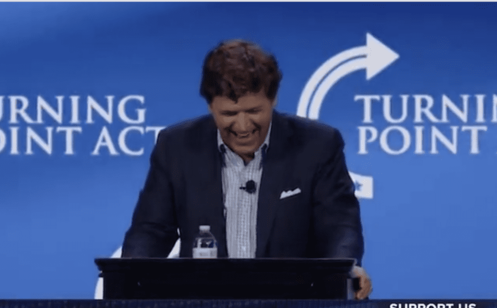 Tucker's Takedown: Analyzing his Critique on U.S. Aid to Ukraine at TPUSA Event