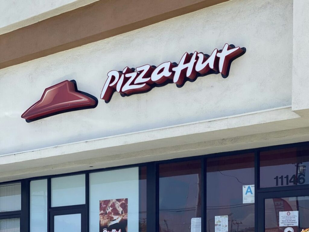 Mass Layoffs at Pizza Hut: California's Wage Hike Shakes Pizza Delivery's Foundation